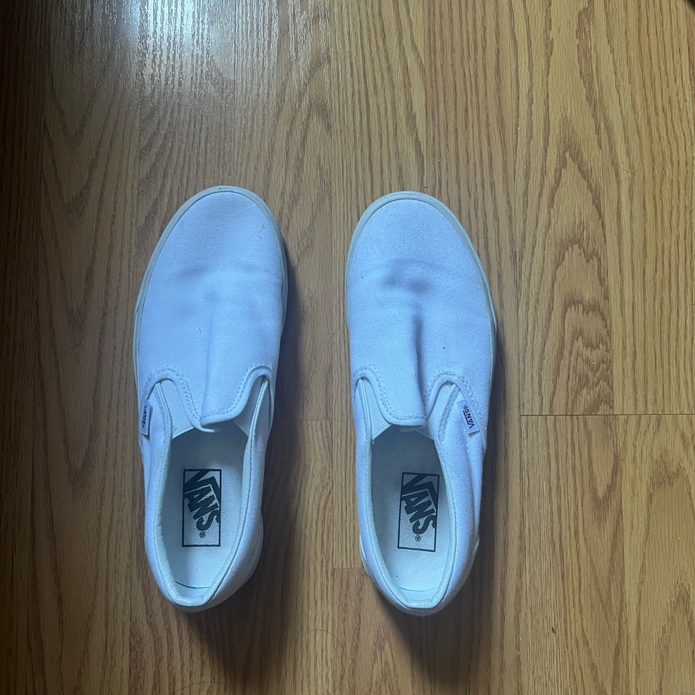 White slip on Vans size 8 women and 6.5 men